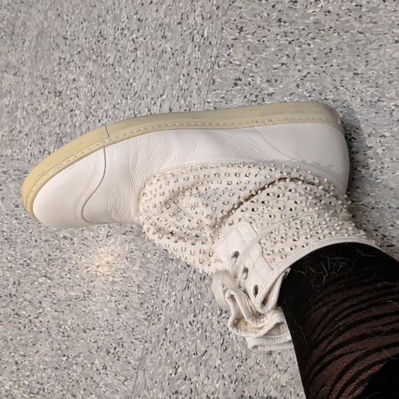 Vivienne Westwood High Top Sneakers In White | Editorialist Vivienne Westwood White Textured High-Top Sneakers